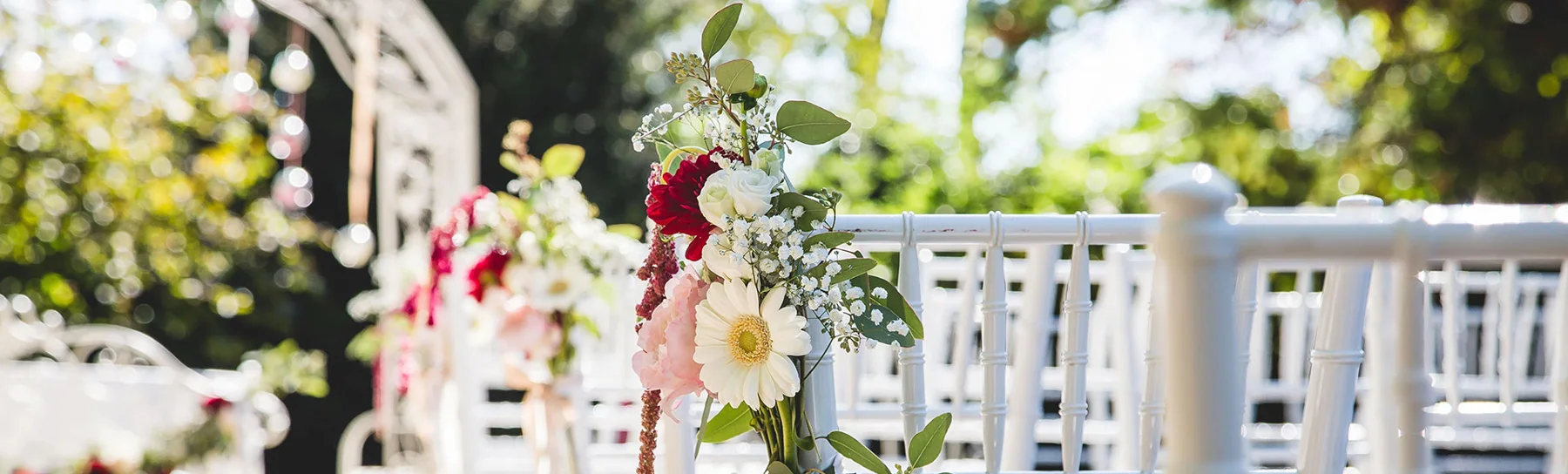 Floral decorations and ceremony chairs at Villa Valentina